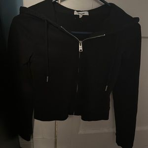 Nice, black, zip up jacket.  Got an XS, by accident.  NEVER WORN.
